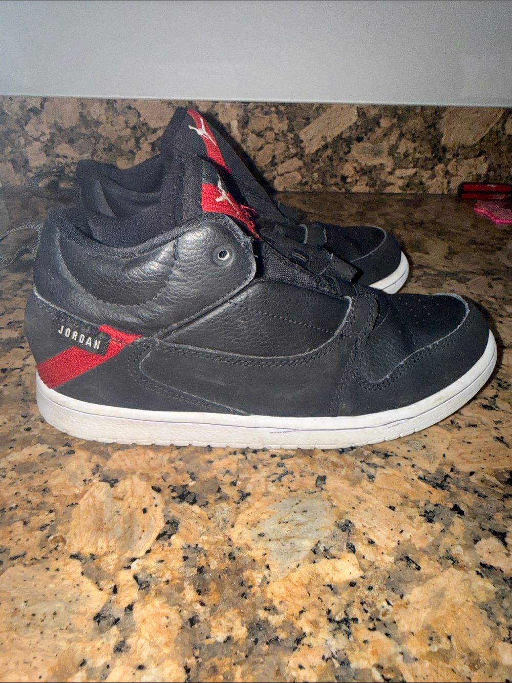 Jordan Black Low-Top Sneakers with Red Accents
